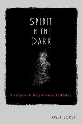 Book jacket featuring the words "Spirit in the Dark" in white against a grainy black background, with a ghostly form beneath 