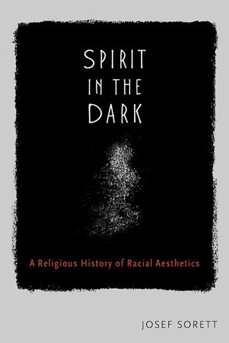 Book jacket featuring the words "Spirit in the Dark" in white against a grainy black background, with a ghostly form beneath